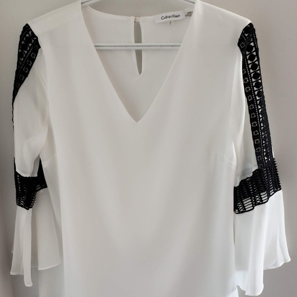 Calvin Klein white blouse with bell sleeves